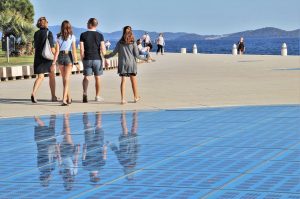 family walking on a zadar seaside