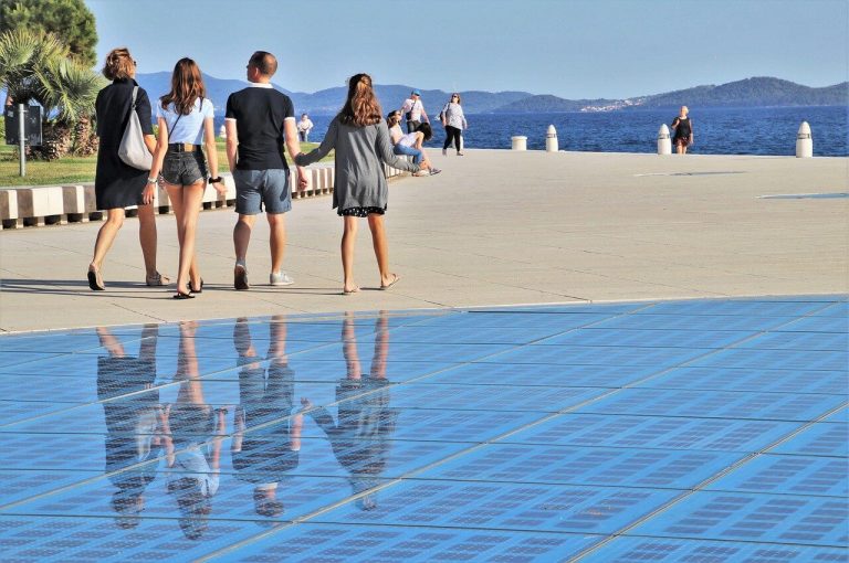 family walking on a zadar seaside